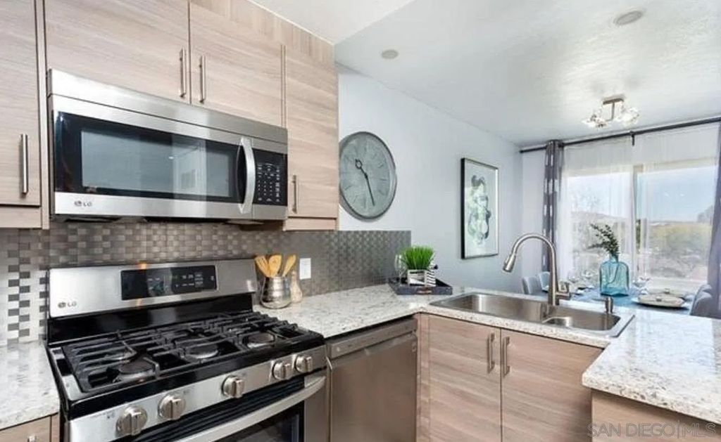 Photo of 8605 Arminda Cir #6, Santee, CA 92071 (MLS # 260002855)