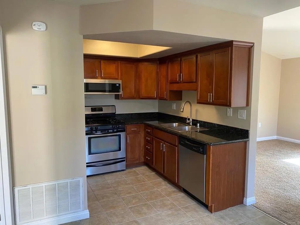 Photo of 100 Sea Cliff Way #104, Oceanside, CA 92056 (MLS # NDP2509695)