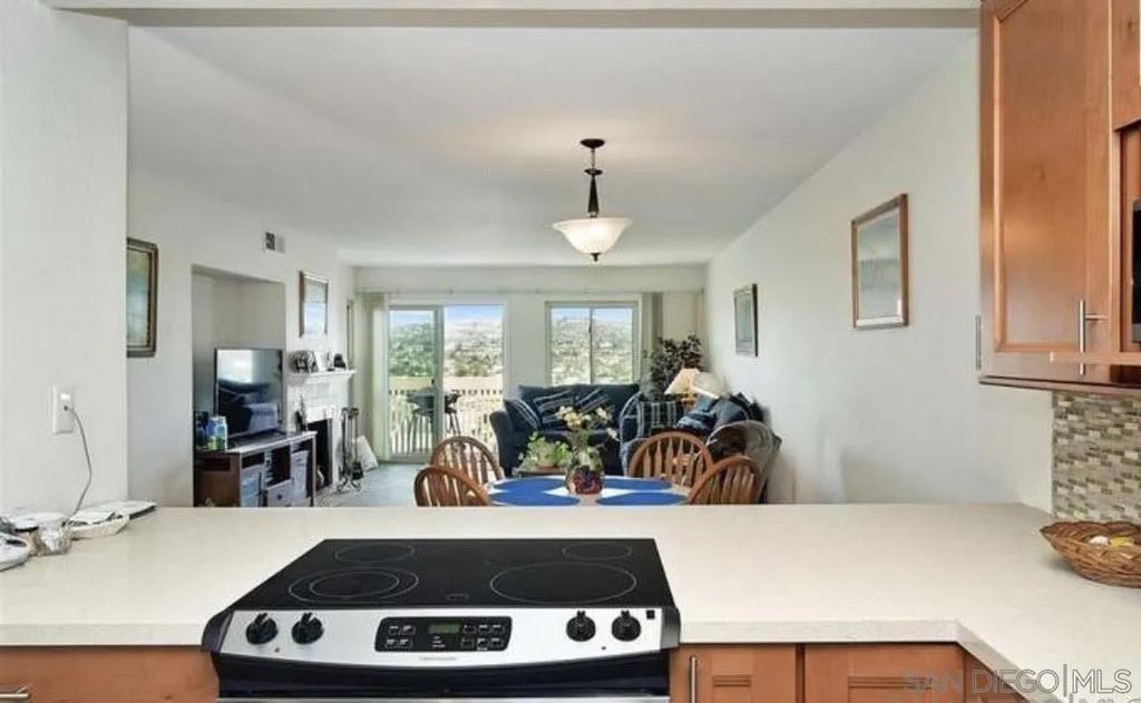 Photo of 6371 Rancho Mission Rd #10, San Diego, CA 92108 (MLS # 2600776)