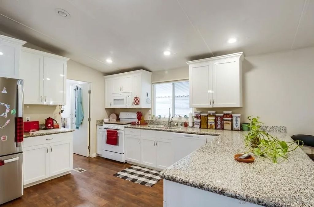 Photo of 11949 Riverside Dr #7, Lakeside, CA 92040 (MLS # 250038258)