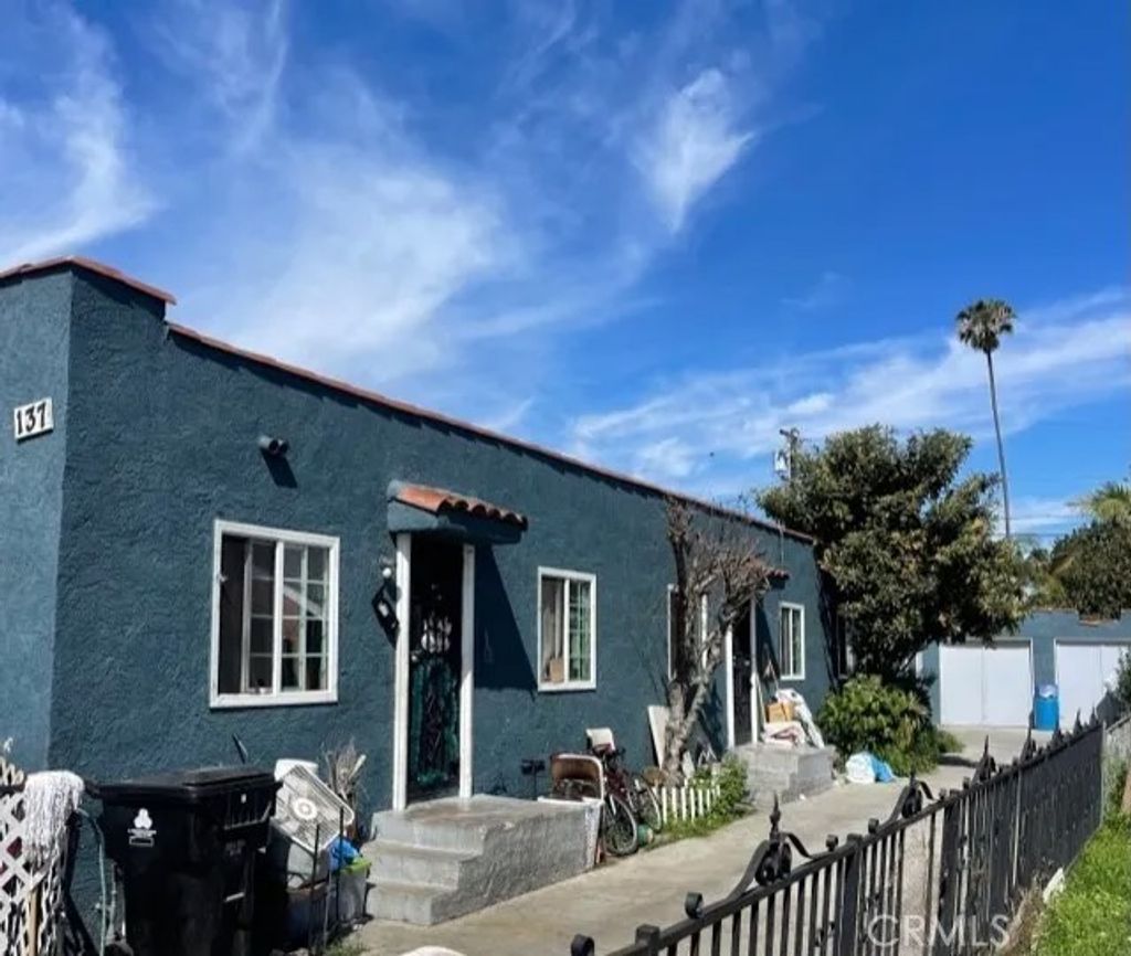 Photo of 135 E 77th St, Los Angeles, CA 90003 (MLS # DW26130033)