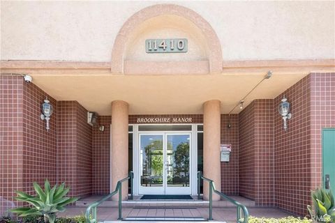 Photo of 11410 Brookshire Ave #117, Downey, CA 90241 (MLS # SR26037322)
