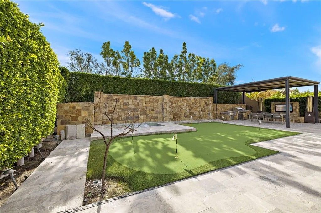 Photo of 108 Grassblade, Irvine, CA 92618 (MLS # OC26034405)