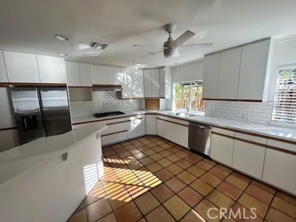 Photo of 8631 Santa Susana Place, West Hills, CA 91304 (MLS # SR26028372)