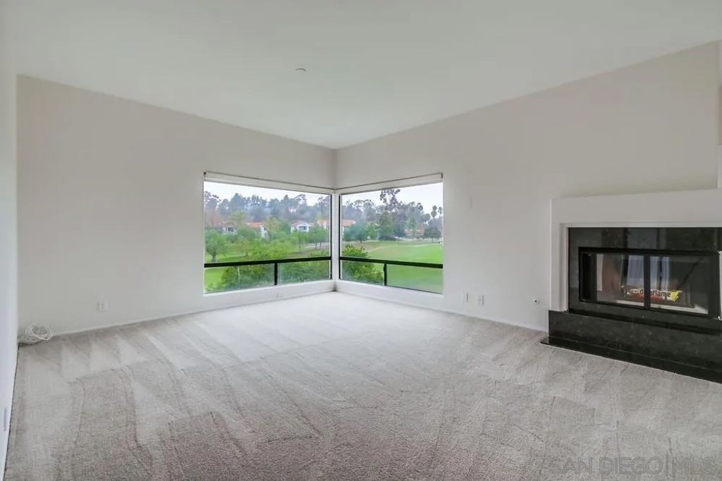 Photo of 12122 Royal Birkdale Row #403, San Diego, CA 92128 (MLS # 250041700)