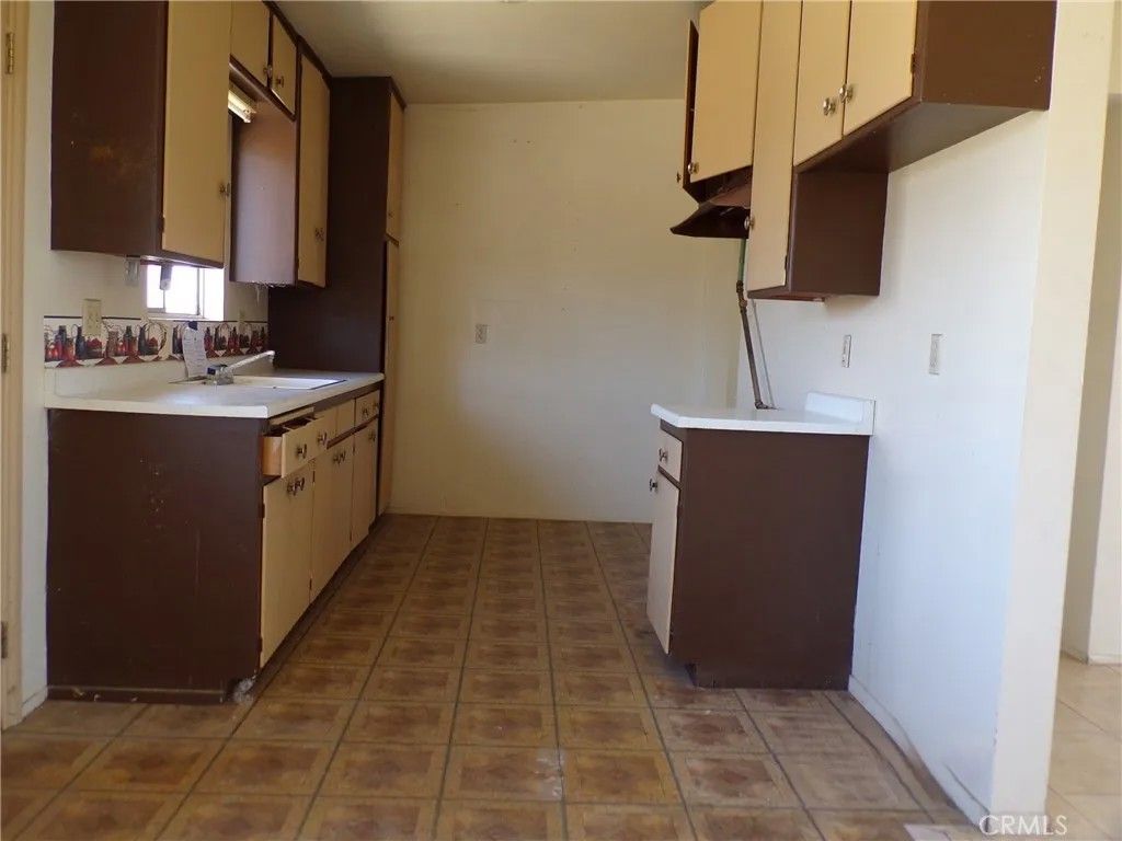 Photo of 6810 Maude Adams Ave, 29 Palms, CA 92277 (MLS # JT26022030)