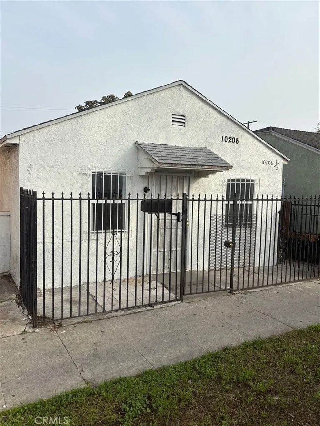 Photo of 10206 S Vermont Ave, Los Angeles, CA 90044 (MLS # WS26038987)