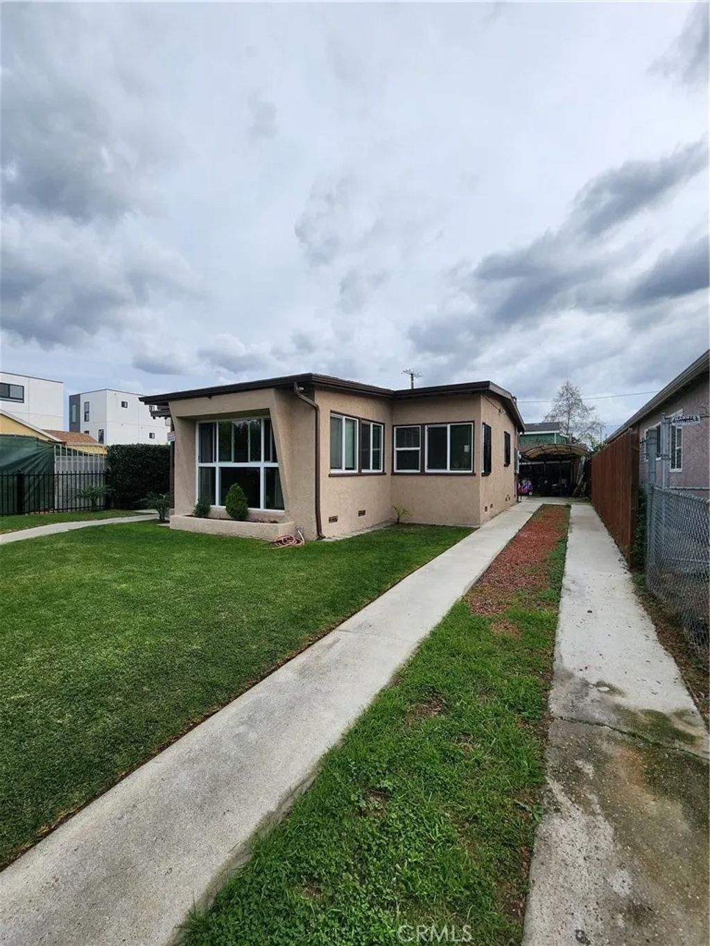 Photo of 1788 W 37th Pl, Los Angeles, CA 90018 (MLS # SB26023065)