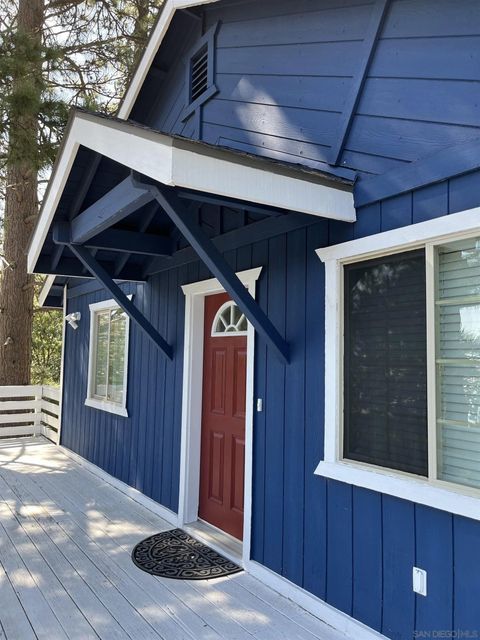 Photo of 30582 Ferndale Dr, Running Springs, CA 92382 (MLS # 250043118)