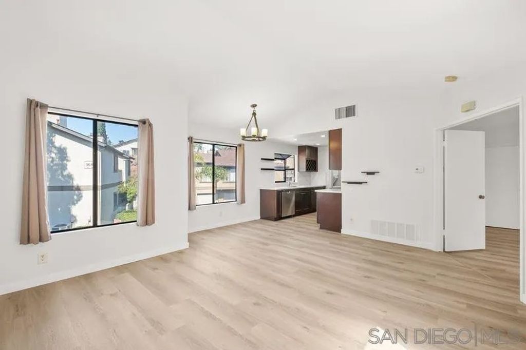 Photo of 3673 Avocado Village Ct #126, La Mesa, CA 91941 (MLS # 250039268)