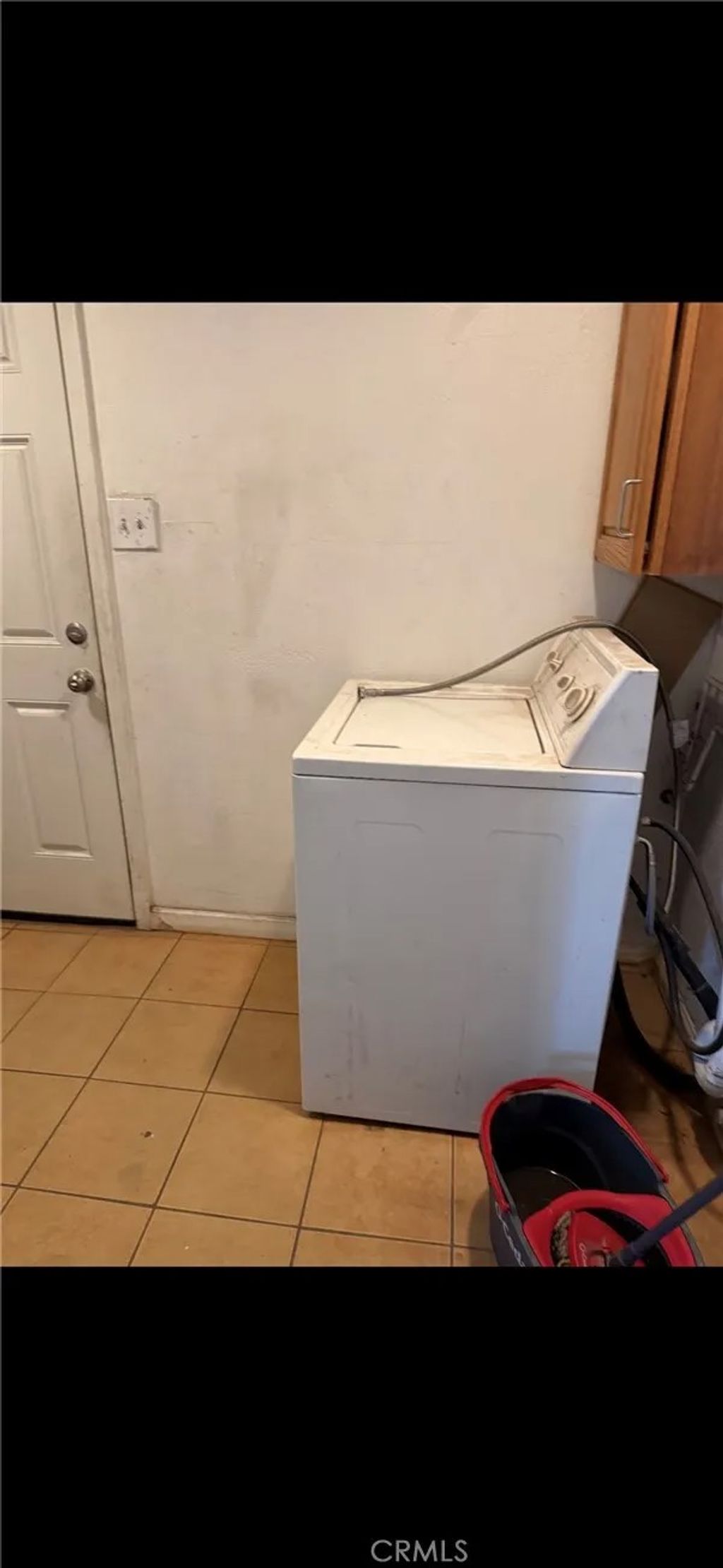 Photo of 210 W Lugonia Ave, Redlands, CA 92374 (MLS # CV26072421)