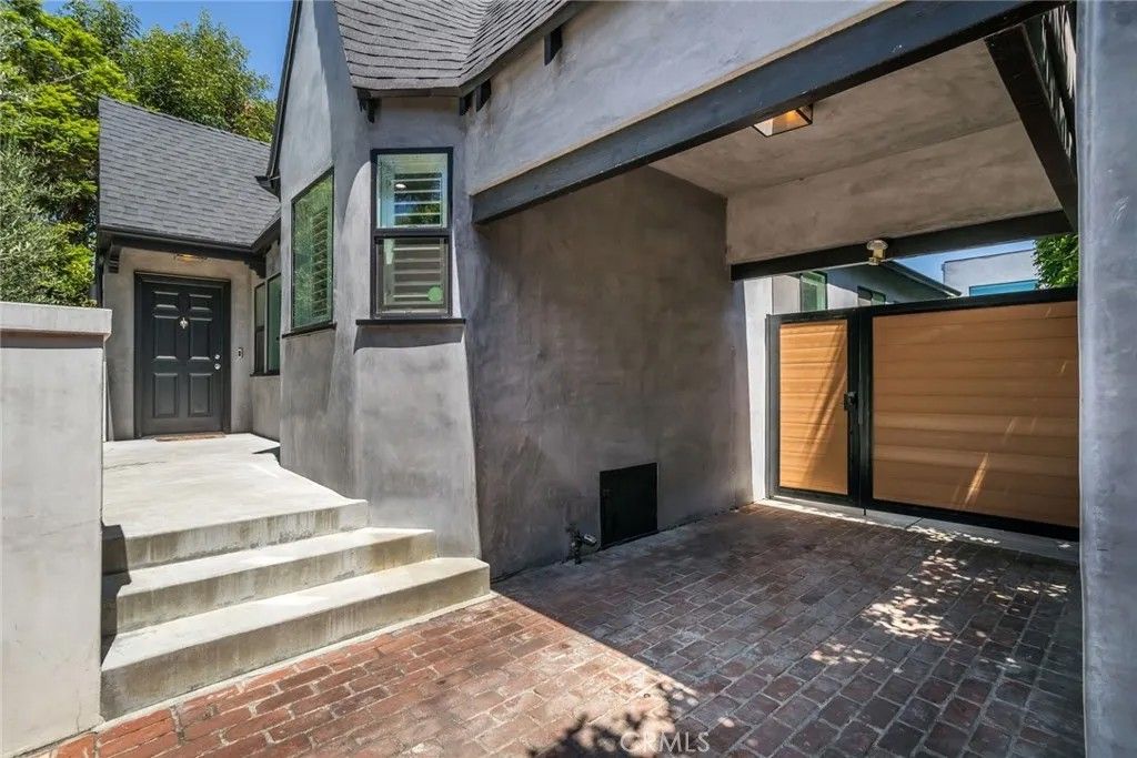 Photo of 1444 Stearns Drive, Los Angeles, CA 90035 (MLS # SR26012436)