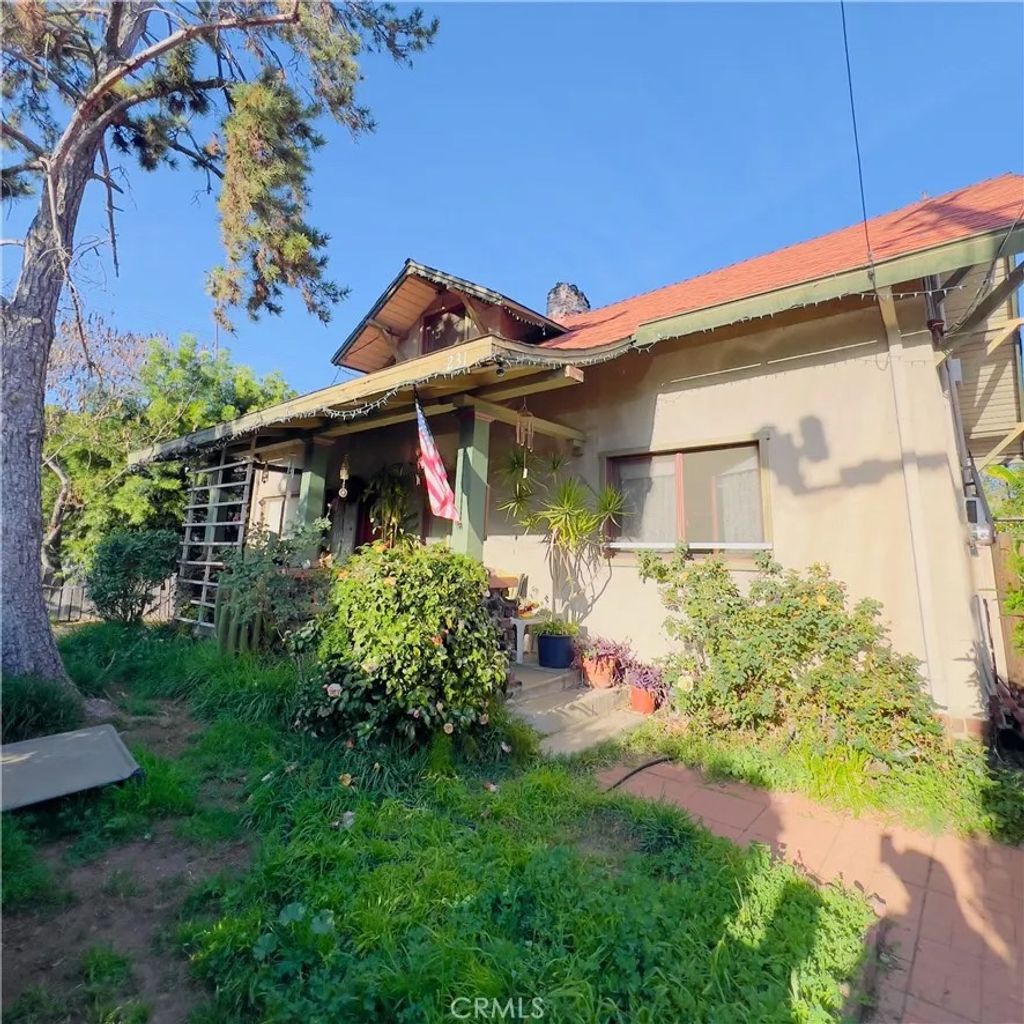 Photo of 231 N Avenue 60 Ave, Los Angeles, CA 90042 (MLS # WS26022758)