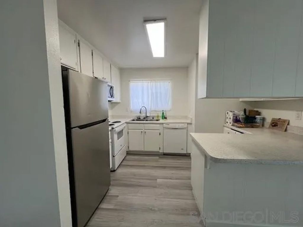 Photo of 521 Sandalwood Pl #8, Escondido, CA 92027 (MLS # 260003080)