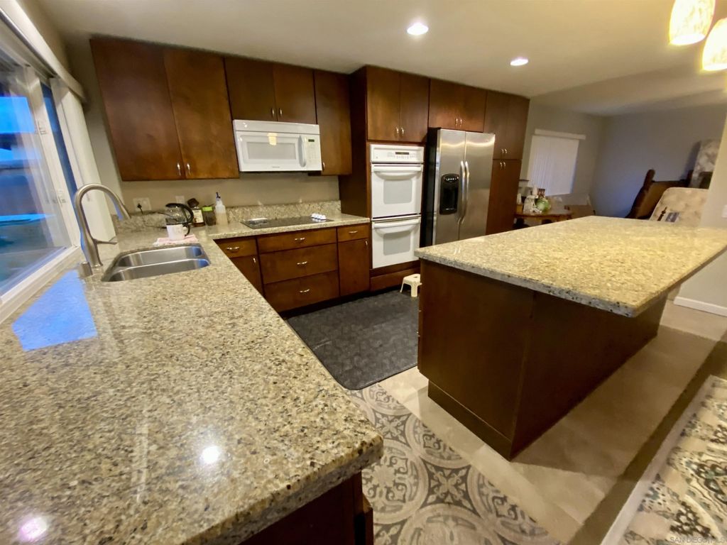 Photo of 12608 Mantilla Rd, San Diego, CA 92128 (MLS # 260010623)