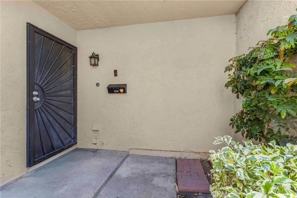 Photo of 1124 S Clifpark Cir #C37P, Anaheim, CA 92805 (MLS # SW26076168)