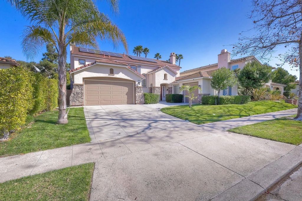 Photo of 993 Hawthorne Creek Dr, Chula Vista, CA 91914 (MLS # 260004345)