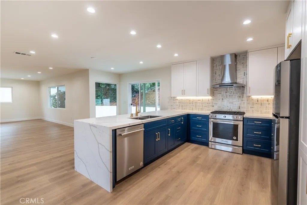 Photo of 3362 Bellota Way, Los Angeles, CA 90027 (MLS # OC26067907)