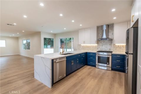 Photo of 3362 Bellota Way, Los Angeles, CA 90027 (MLS # OC26067907)