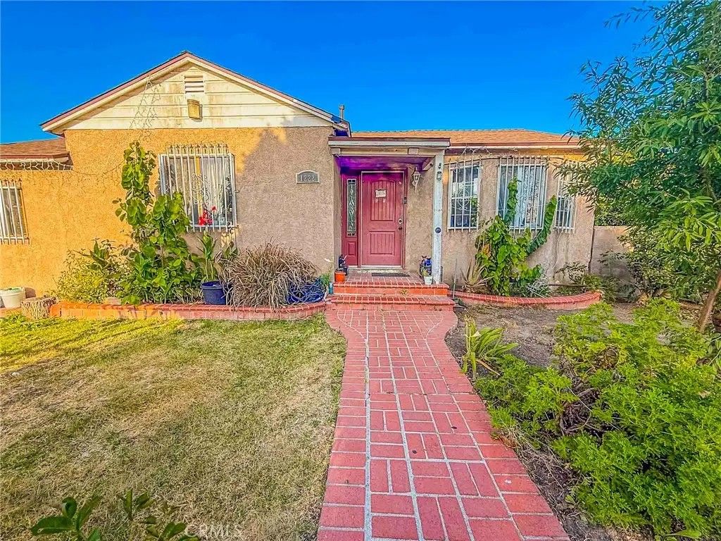 Photo of 1222 S Kemp AVE, Compton, CA 90220 (MLS # DW26098763)