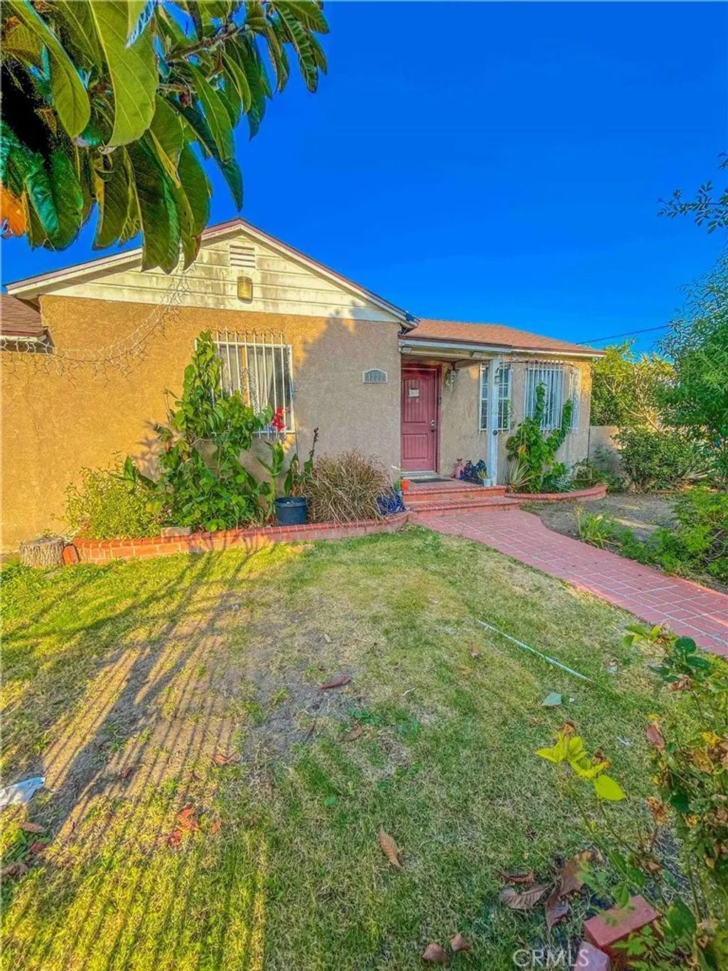 Photo of 1222 S Kemp AVE, Compton, CA 90220 (MLS # DW26098763)