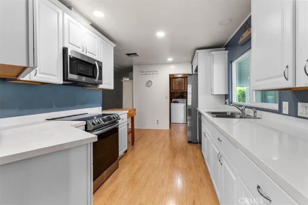 Photo of 16222 Monterey Ln, Huntington Beach, CA 92649 (MLS # IG26078457)