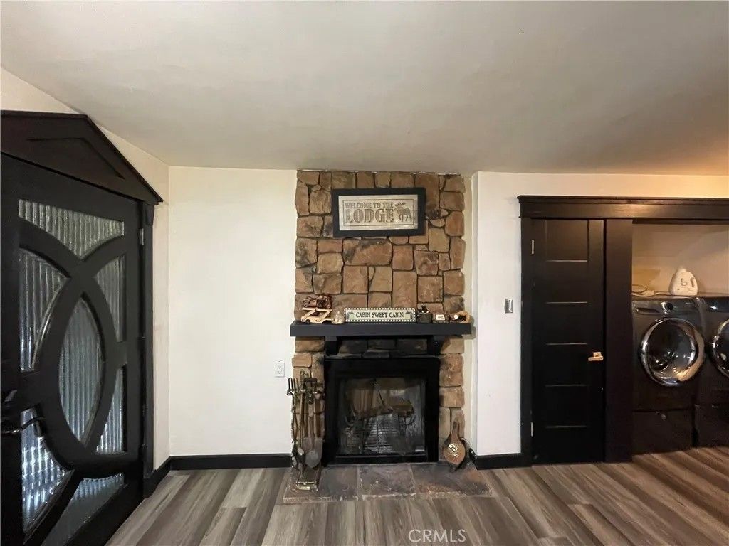Photo of 402 Holmes Ln, Sugarloaf, CA 92386 (MLS # IG26040603)