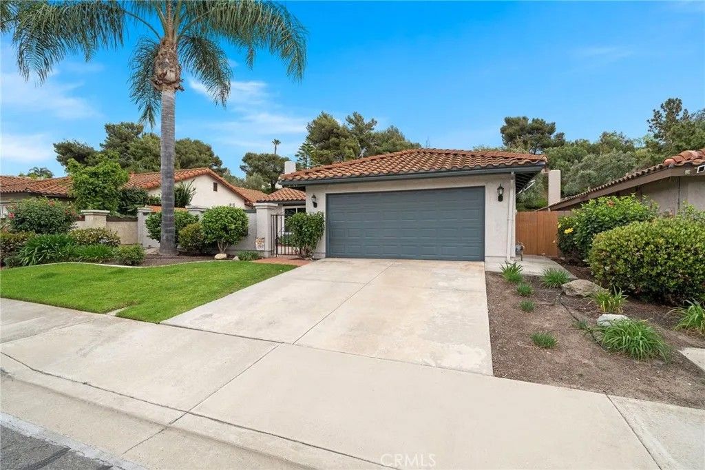 Photo of 4889 Tarragon Dr, Oceanside, CA 92057 (MLS # OC26065703)