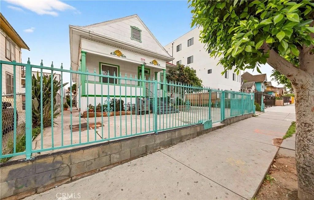 Photo of 1324 Magnolia Avenue, Los Angeles, CA 90006 (MLS # SB26037039)
