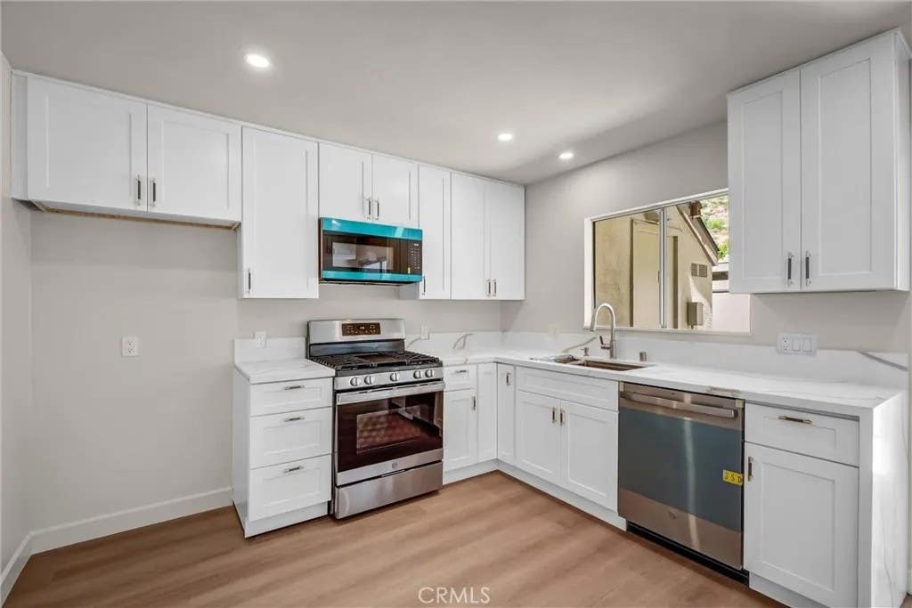 Photo of 307 N Singingwood ST #8, Orange, CA 92869 (MLS # PW26103138)