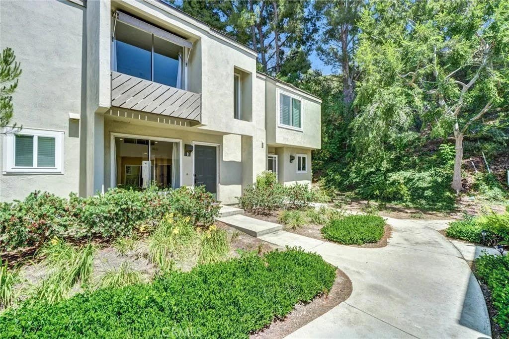 Photo of 307 N Singingwood ST #8, Orange, CA 92869 (MLS # PW26103138)