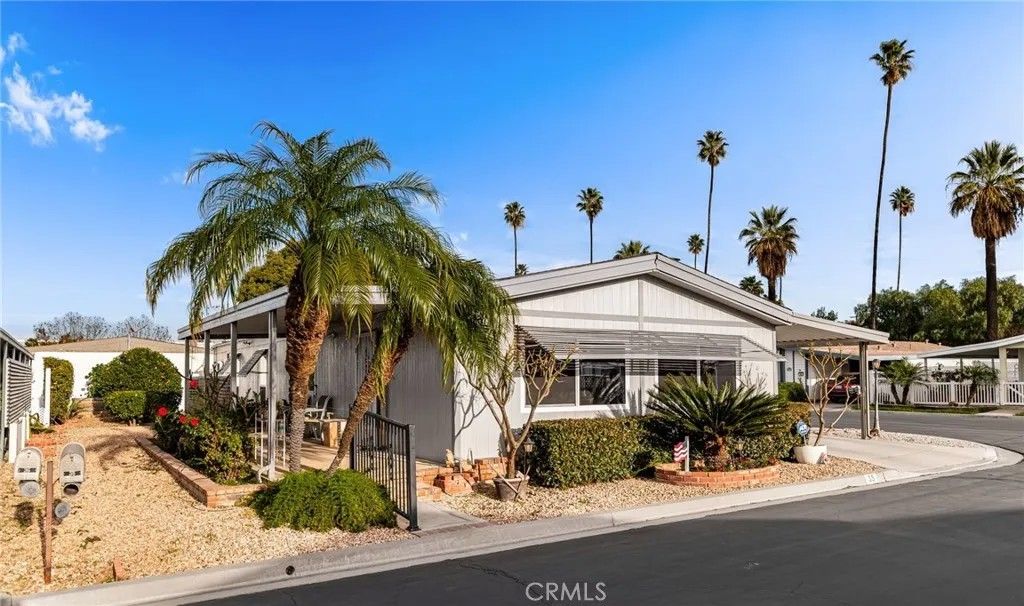 Photo of 13381 Magnolia Ave #35, Corona, CA 92879 (MLS # IV26014971)