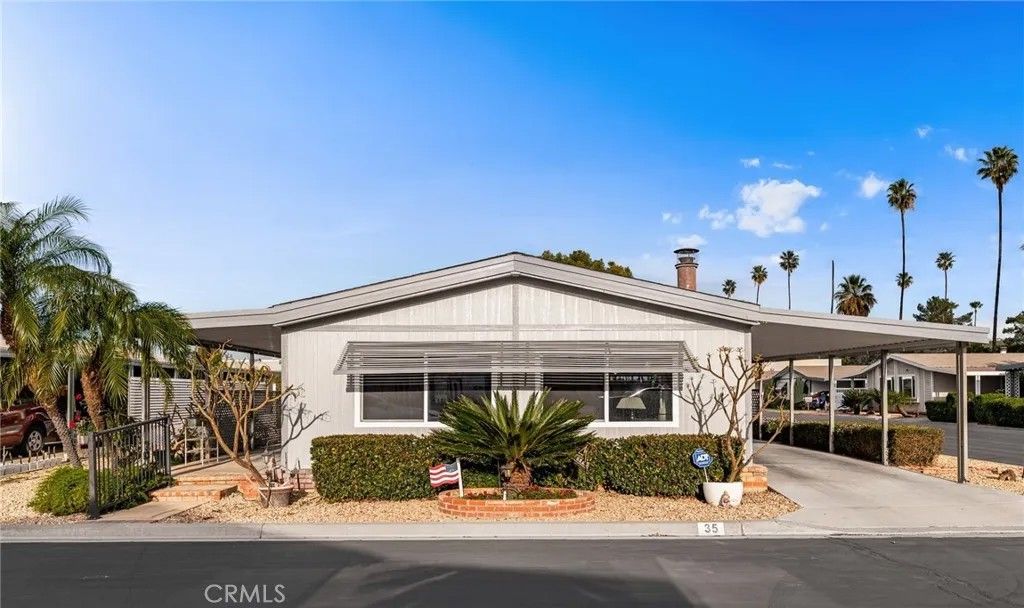 Photo of 13381 Magnolia Ave #35, Corona, CA 92879 (MLS # IV26014971)