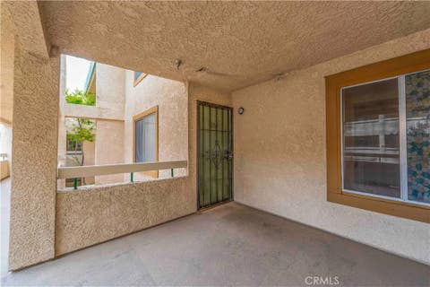 Photo of 12121 Centralia Street Unit #206 ST, Lakewood, CA 90715 (MLS # DW26144814)