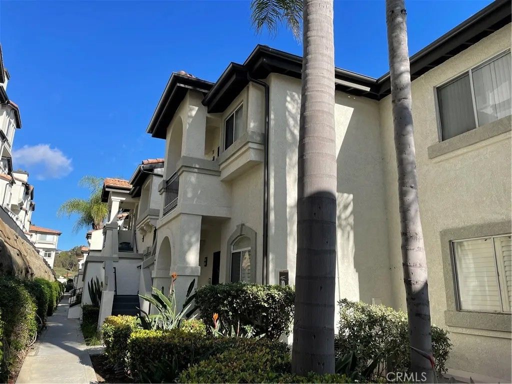 Photo of 30902 Clubhouse Dr #18E, Laguna Niguel, CA 92677 (MLS # OC26004797)