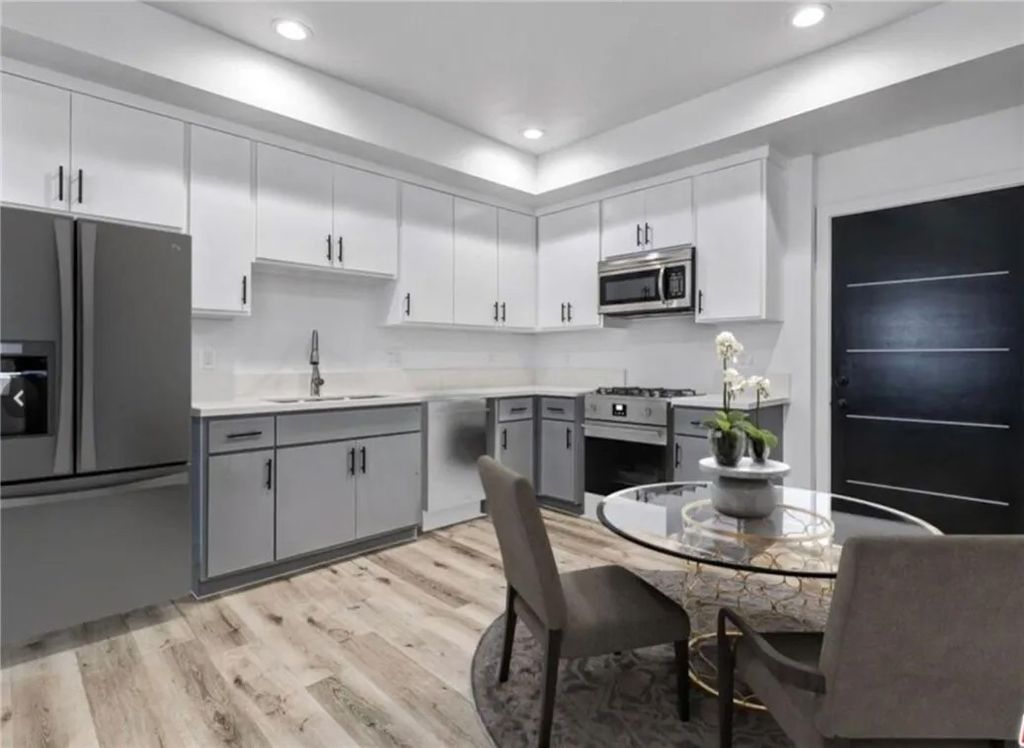 Photo of 4643 W 18th Street, Los Angeles, CA 90019 (MLS # BB26054141)