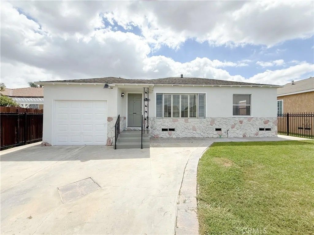 Photo of 1410 W School Street, Compton, CA 90220 (MLS # IG26071723)