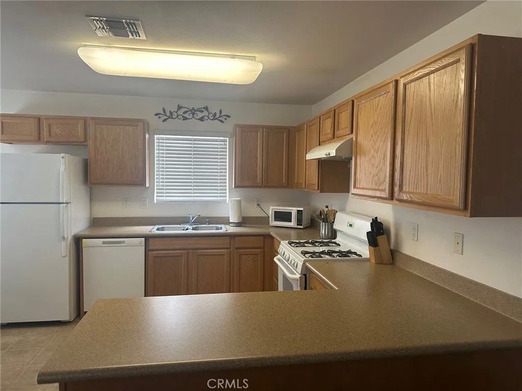 Photo of 73482 Desert Trail #4, 29 Palms, CA 92277 (MLS # SW25252290)