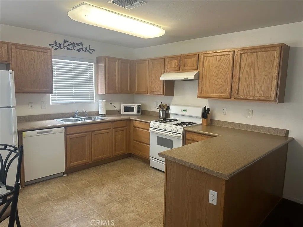 Photo of 73482 Desert Trail #4, 29 Palms, CA 92277 (MLS # SW25252290)