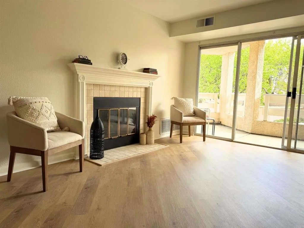 Photo of 7067 Camino Revueltos #310, San Diego, CA 92111 (MLS # PTP2601040)