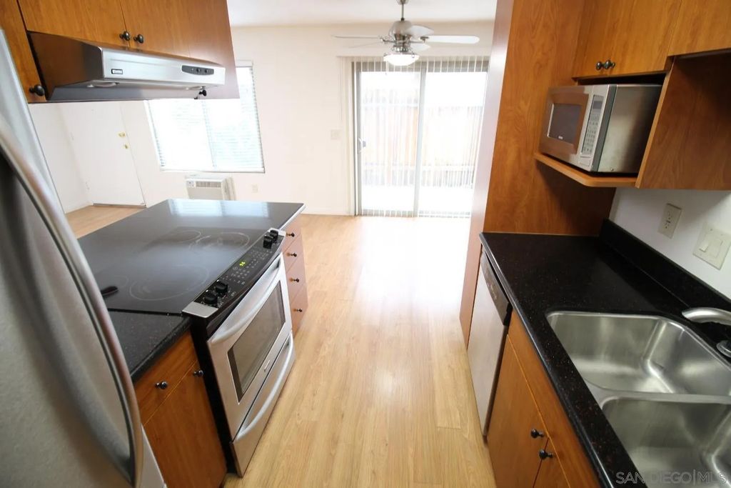 Photo of 9574 Carroll Canyon Road #153, San Diego, CA 92126 (MLS # 240011185)