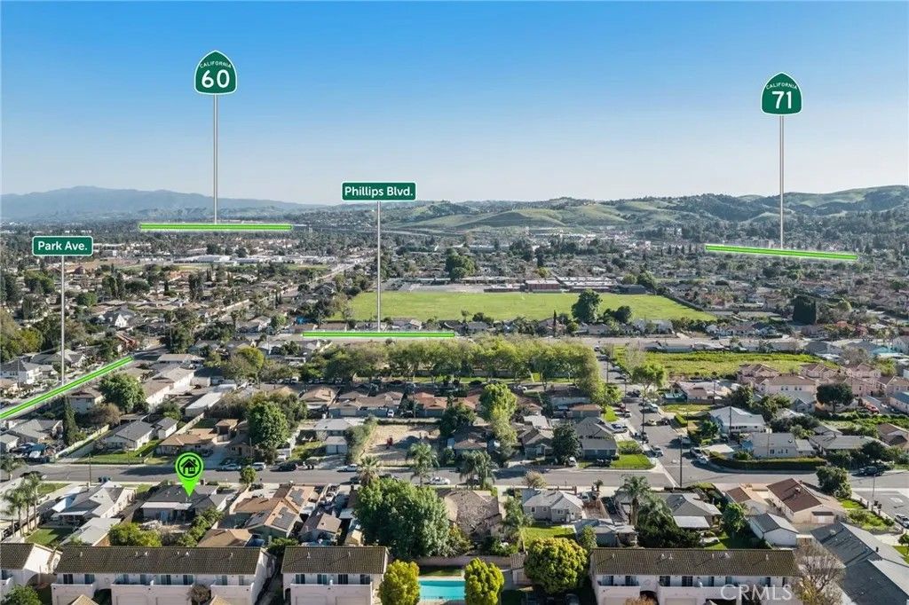 Photo of 587 W Fernleaf Ave, Pomona, CA 91766 (MLS # PW26066096)