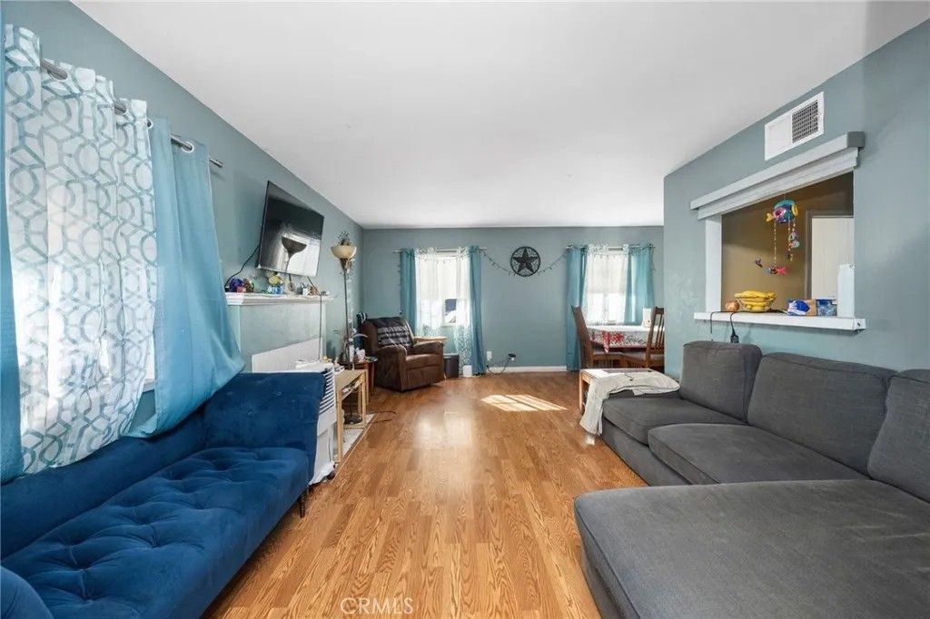 Photo of 587 W Fernleaf Ave, Pomona, CA 91766 (MLS # PW26066096)