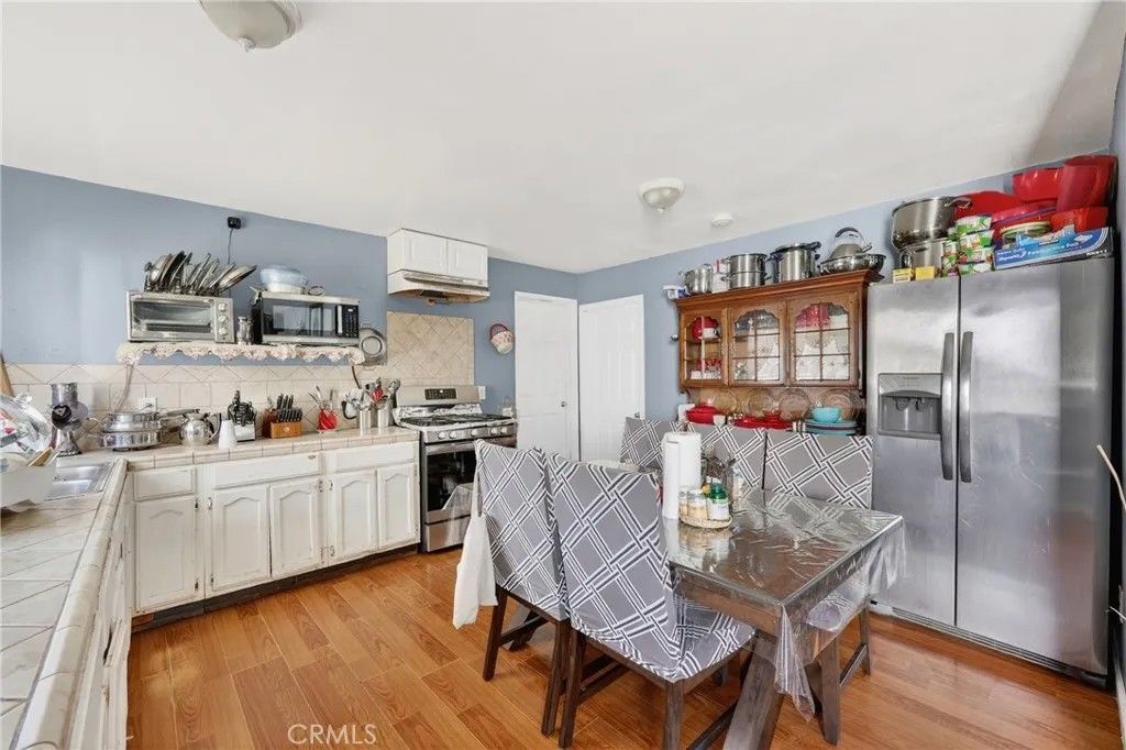 Photo of 750 E 48th St, Los Angeles, CA 90011 (MLS # DW26063559)