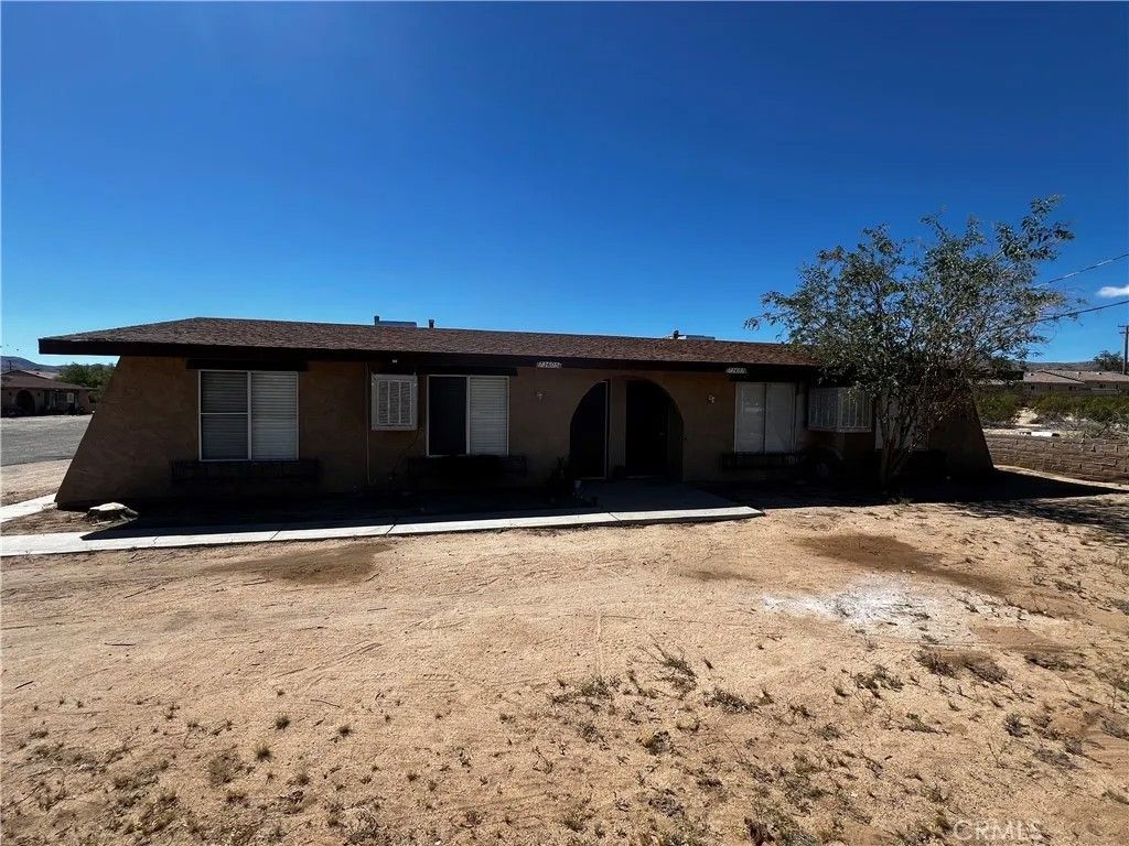 Photo of 73601 Sun Valley Drive, 29 Palms, CA 92277 (MLS # SW26072327)