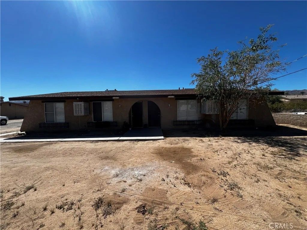 Photo of 73601 Sun Valley Drive, 29 Palms, CA 92277 (MLS # SW26072327)