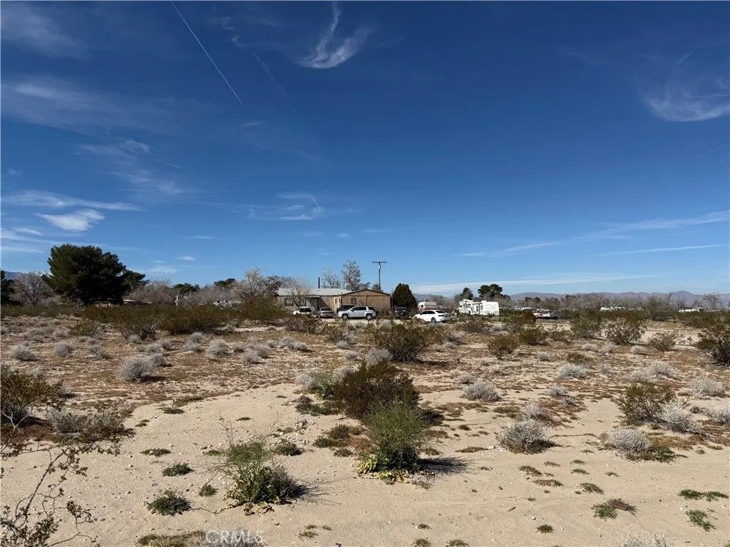 Photo of 10248 Cavetto Rd, Lucerne Valley, CA 92356 (MLS # IV26049909)