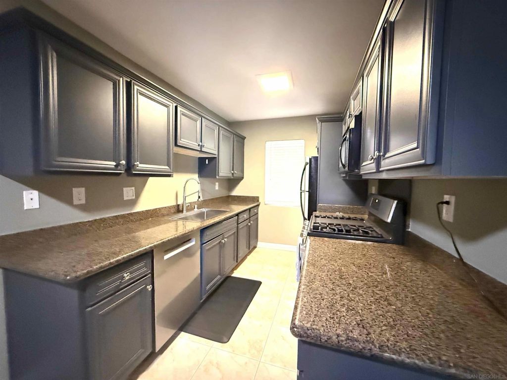 Photo of 5511 Adelaide Ave #21, San Diego, CA 92115 (MLS # 260007316)