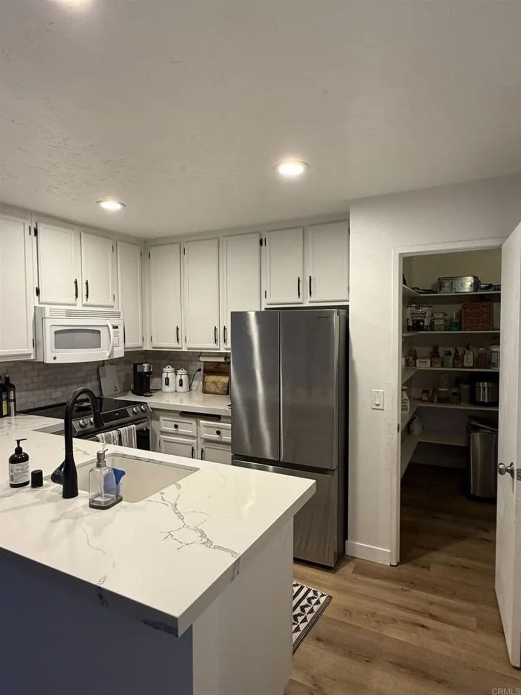 Photo of 7704 Caminito Tingo #102, Carlsbad, CA 92009 (MLS # NDP2511522)