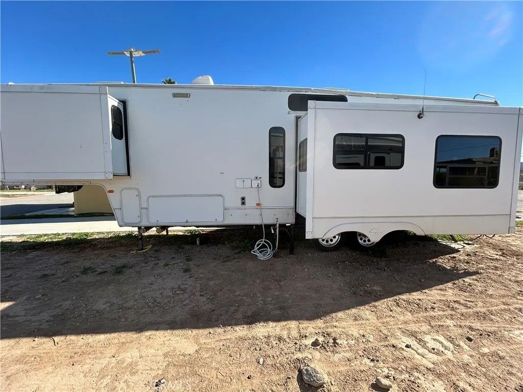 Photo of 251 S. Colorado River Rd #54, Blythe, CA 92225 (MLS # IV26028388)